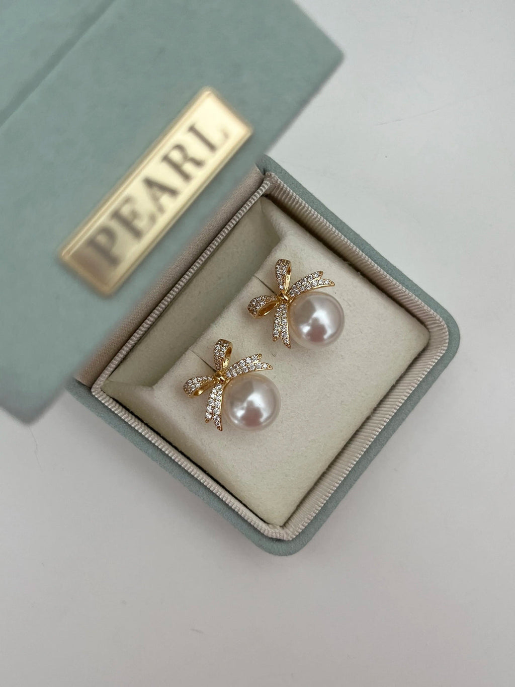 Pearl Ribbon Stud Earrings